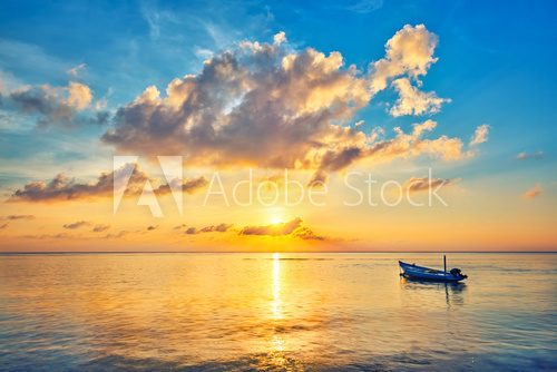 Fototapeta Colorful sunrise over ocean on Maldives