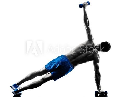 Fototapeta man exercising fitness plank position exercises silhouette