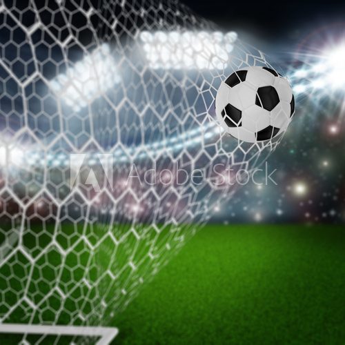 Fototapeta soccer ball in goal net