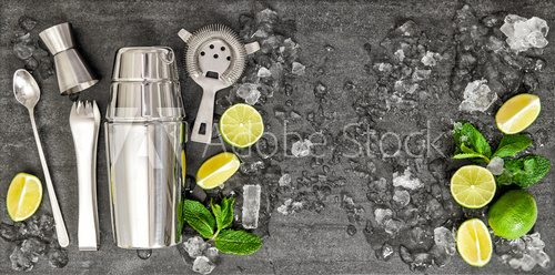 Fototapeta Accessories and ingredients for cocktail lime, mint, ice