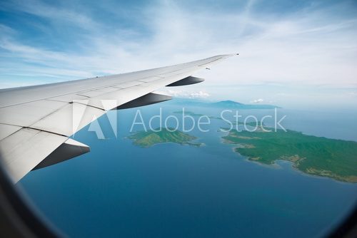 Fototapeta Aerial View of jet plane wing