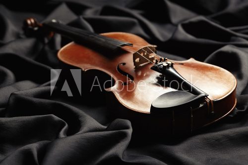Fototapeta aged violin on dark texture