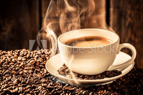 Fototapeta Aroma coffee cup with roasted grains