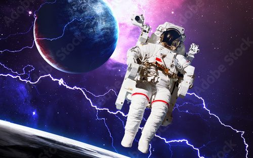 Fototapeta Astronaut in outer space. Spacewalk. Elements of this image furnished by NASA
