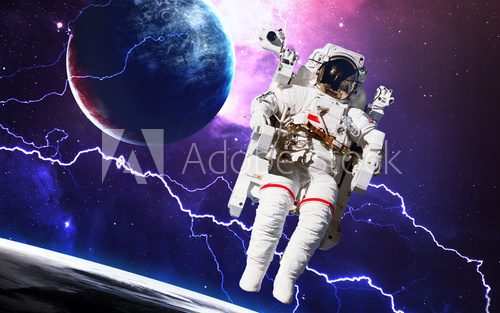 Fototapeta Astronaut in outer space. Spacewalk. Elements of this image furnished by NASA