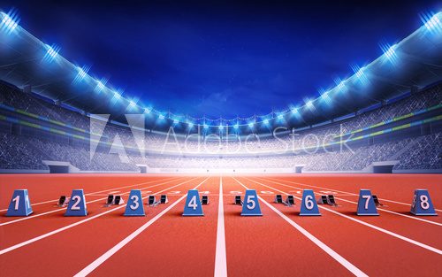 Fototapeta athletics stadium with race track with starting blocks