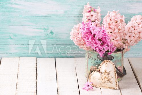 Fototapeta Background with  pink hyacinths in  bowl, beige decorative  hear