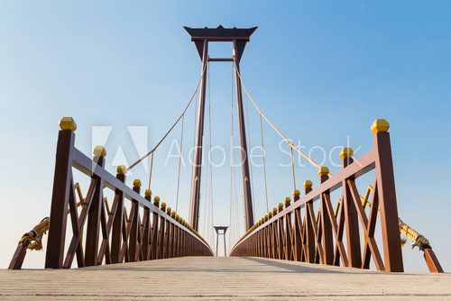 Fototapeta Beautiful bridge against blue sky background