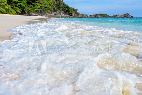 Fototapeta Beautiful landscape blue sea white sand and waves on the beach during summer at Koh Miang island in Mu Ko Similan National Park, Phang Nga province, Thailand
