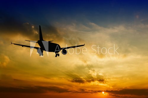 Fototapeta Beautiful view of silhouette of airplane