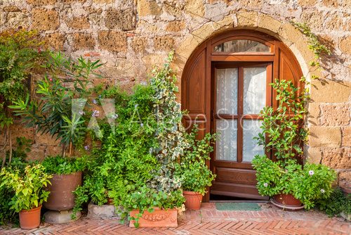 Fototapeta Beautifully decorated porch in Tuscany