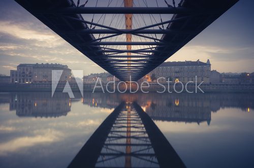 Fototapeta Bernatka footbridge over Vistula river in Krakow early morning