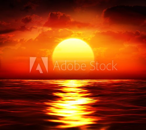 Fototapeta big sunset over sea - summer theme
