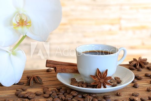 Fototapeta Black coffee with cinnamon
