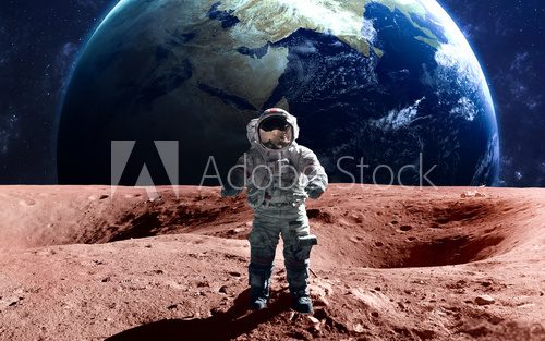 Fototapeta Brave astronaut at the spacewalk on the mars. This image elements furnished by NASA.