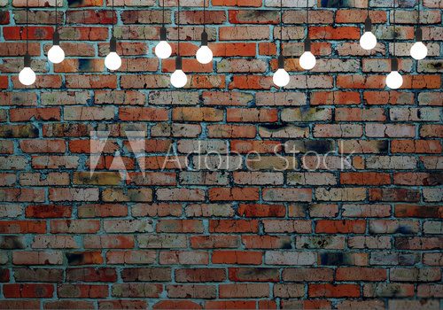 Fototapeta Brick wall with glowing light bulbs. 3d illustration