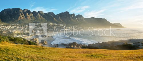 Fototapeta Camps Bay Beach in Cape Town, South Africa, with the Twelve Apostles in the background.