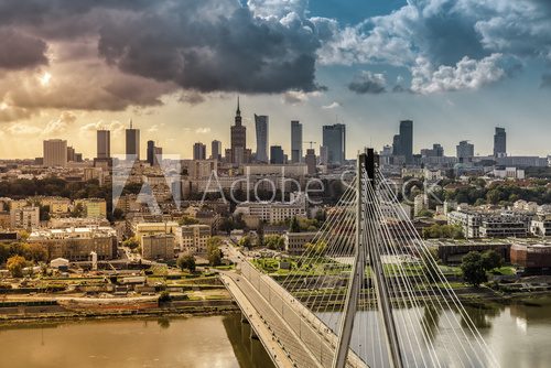 Fototapeta City of Warsaw skyline behind the bridge, Poland