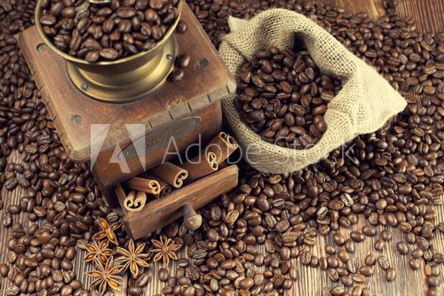 Fototapeta Coffee beans and old grinder