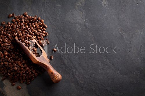Fototapeta Coffee beans on stone table