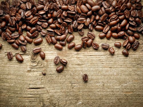 Fototapeta coffee beans on wooden table