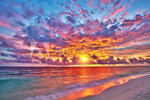 Fototapeta Colorful sunset over ocean on Maldives