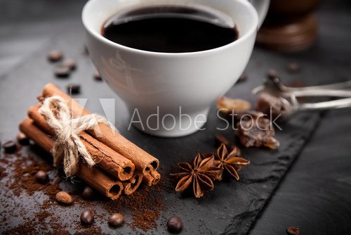 Fototapeta Cup of coffee on stone board