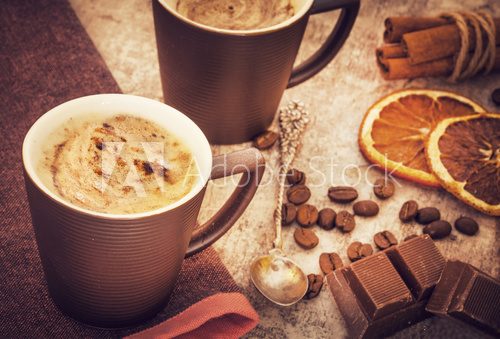Fototapeta Cups of coffee on wooden