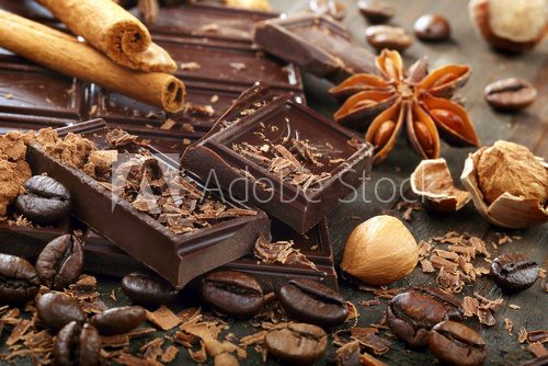 Fototapeta Dark chocolate with coffee beans cinnamon and star anise