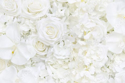 Fototapeta Decoration artificial white roses flower bouquet as a floral wallpaper with soft focus and copy space. White rose and orchid petals background for valentines day or wedding ceremony.