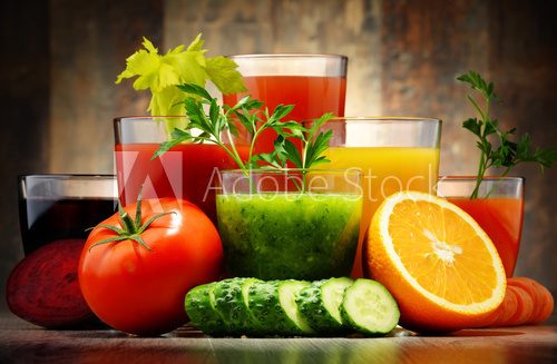 Fototapeta Glasses with fresh organic vegetable and fruit juices