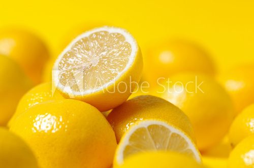 Fototapeta group of lemon on yellow background