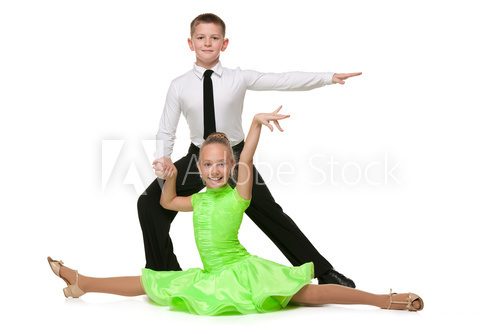 Fototapeta Happy boy and girl are dancing