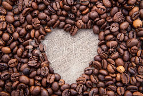 Fototapeta Heart symbol within roasted coffee beans
