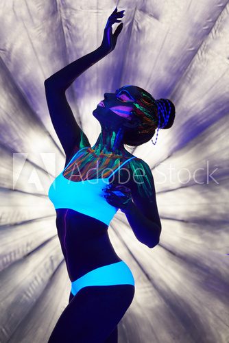 Fototapeta Image of graceful girl with luminous body art