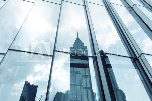 Fototapeta landmarks reflection on glass walls of skyscrapers
