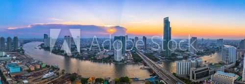 Fototapeta Landscape of river in Bangkok cityscape with sunset