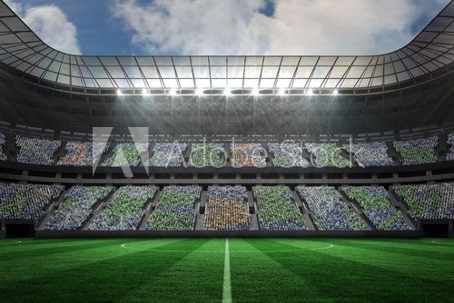 Fototapeta Large football stadium under spotlights