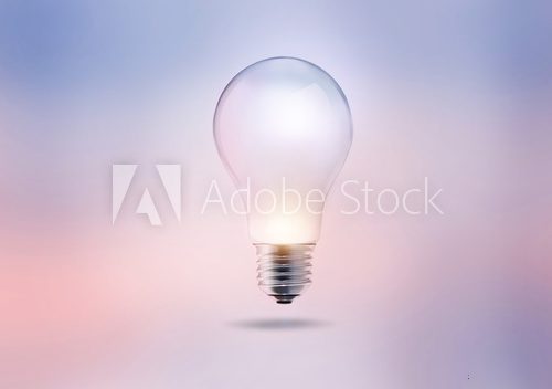 Fototapeta light bulb on a pastel color tone background