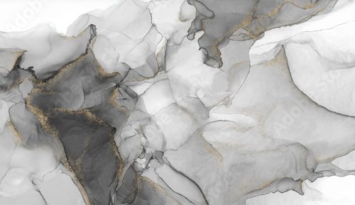 Fototapeta Luxury abstract fluid art painting in alcohol ink technique, mixture of black, gray and gold paints. Imitation of marble stone cut