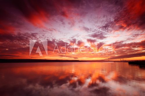 Fototapeta majestic sunset over water