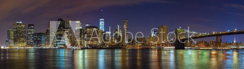 Fototapeta Manhattan skyline at night, New York panoramic picture, USA.