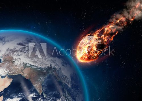 Fototapeta Meteor glowing as it enters the Earth's atmosphere