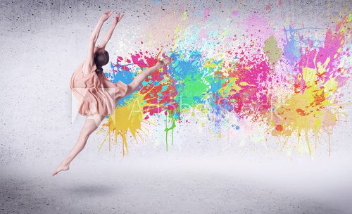 Fototapeta Modern street dancer jumping with colorful paint splashes