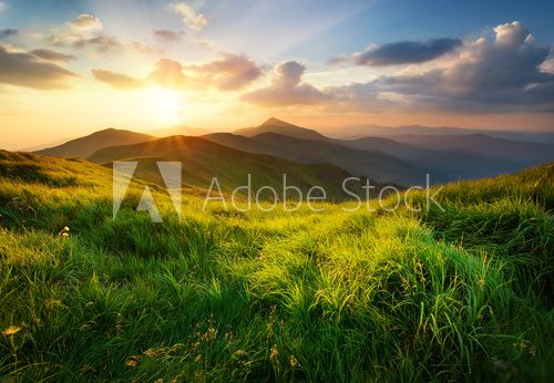 Fototapeta Mountain valley during sunrise. Natural summer landscape.