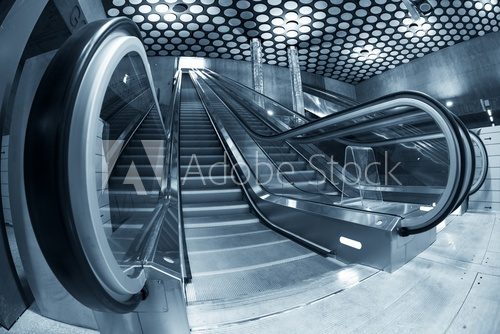 Fototapeta Moving escalator in the business center