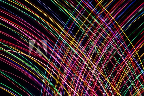Fototapeta Neon lights in motion. Abstract colorful shiny background.