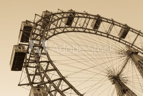 Fototapeta Old ferris wheel in Prater park in Vienna, sepia