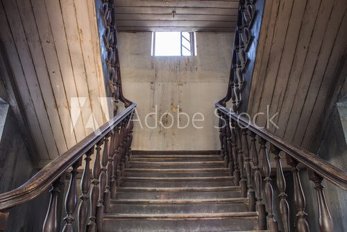 Fototapeta old wooden staircase railing