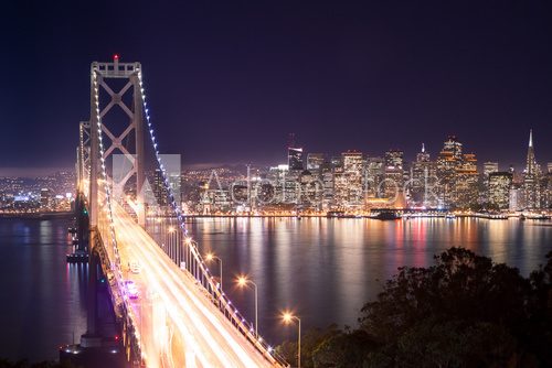 Fototapeta Panorama di San Francisco e Bay Bridge di notte